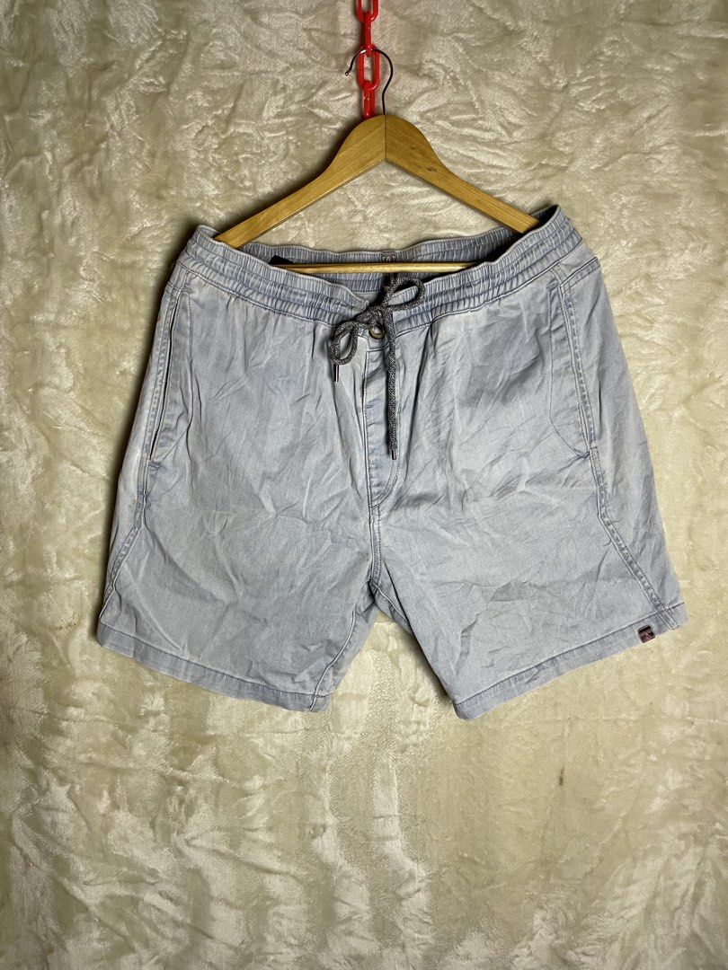Volcom Light Blue Denim Drawstring Shorts XL (Category: Shorts) located in Molave. Submitted by charlesthrifter (Listing ID 1470854172, Image 1). Description: - Brand: Volcom - Size: XL - Color: Light Blue - Material: Cotton and elastane blend for stretch and comfort - Waistband: Elastic with a grey patterned drawstring - Pockets: Single back pocket with a button flap - Details: Woven brand patch on the back - Condition: Perfect for everyday casu