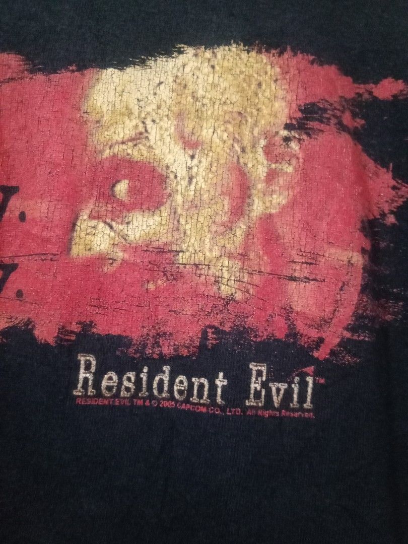 Vtg 2005 resident evil itchy tasty capcom (Category: Vintage Collectibles) located in Santo Tomas. Submitted by rexadominice (Listing ID 1470925872, Image 3). Description: resident evil gaming tee grail item dated 2005 Capcom w19 x L26.5 going 27 see photos Gildan activewear 2 2 2 stitching cut half info tag need wash, penhole hem part sa likod.