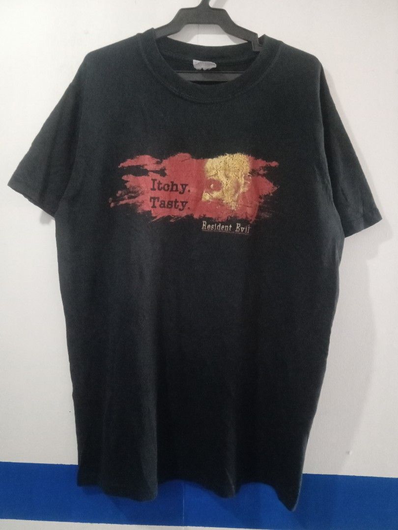 Vtg 2005 resident evil itchy tasty capcom (Category: Vintage Collectibles) located in Santo Tomas. Submitted by rexadominice (Listing ID 1470925872, Image 2). Description: resident evil gaming tee grail item dated 2005 Capcom w19 x L26.5 going 27 see photos Gildan activewear 2 2 2 stitching cut half info tag need wash, penhole hem part sa likod.