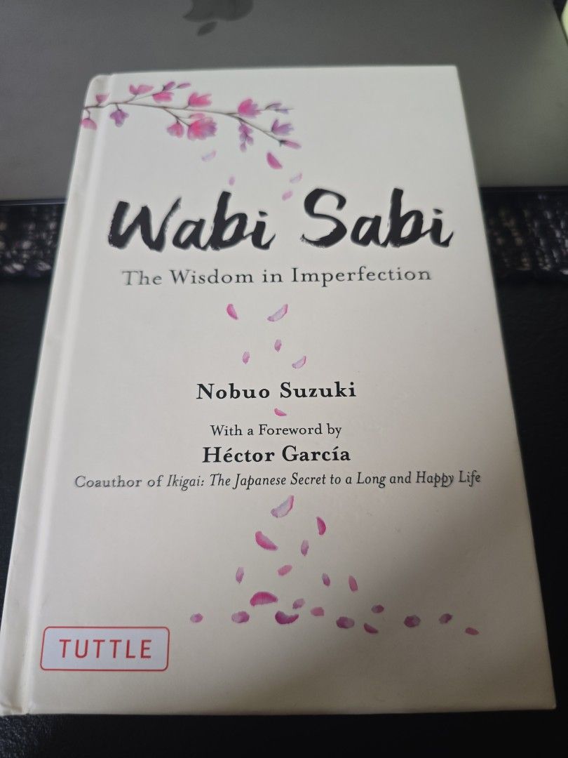 Wabi Sabi (Category: Storybooks) located in Rizal. Submitted by imnotraf (Listing ID 1470931555, Image 1). Description: - Title: Wabi Sabi: The Wisdom in Imperfection - Author: Nobuo Suzuki - Foreword by: Héctor García (coauthor of Ikigai) - Publisher: Tuttle - Format: Softcover with a charming pink floral petal design - Genre: Japanese philosophy / Self-care / Mindfulness .