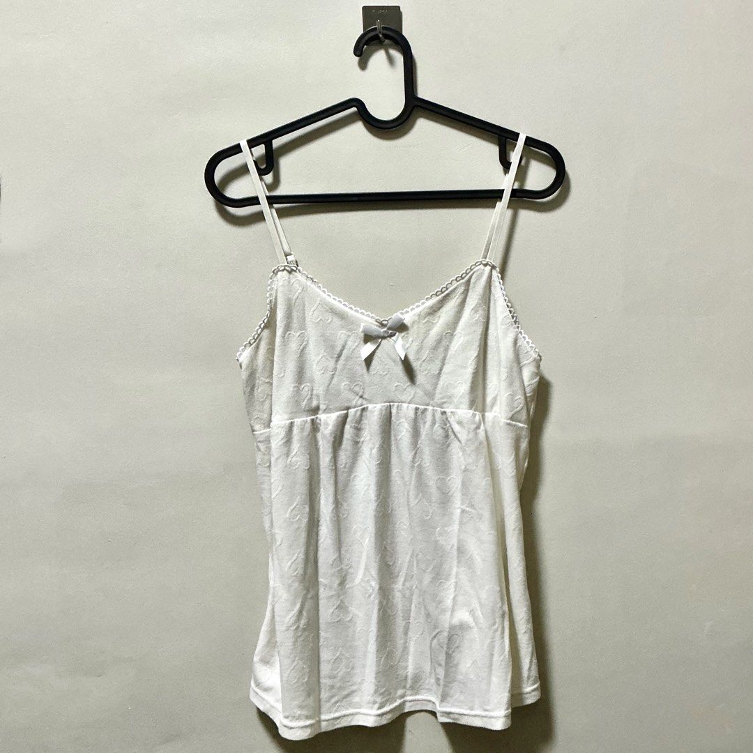 White Camisole Top (Category: Sleeveless) located in Manila. Submitted by ari.kki (Listing ID 1470749373, Image 1). Description: . size small.