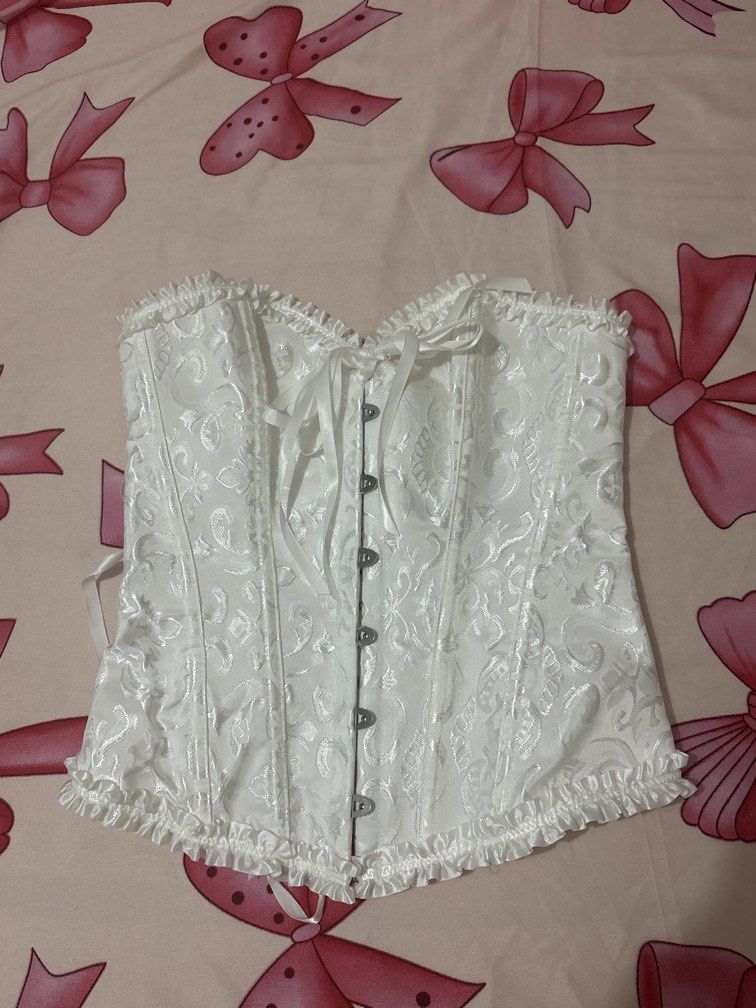 White Corset (Category: Others Tops) located in Balanga. Submitted by melonayee (Listing ID 1470864325, Image 1). Description: only used once. Perfect for halloween! went as mad hatter w/ this..
