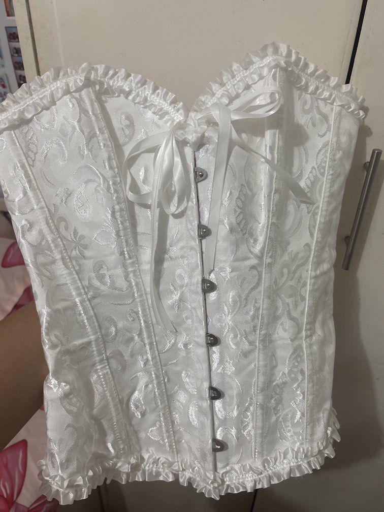 White Corset (Category: Others Tops) located in Balanga. Submitted by melonayee (Listing ID 1470864325, Image 2). Description: only used once. Perfect for halloween! went as mad hatter w/ this..