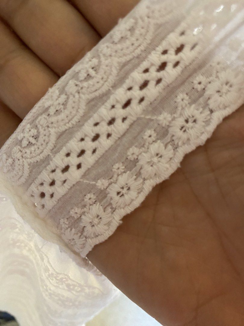 White Eyelet Lace Tank Top Camisole (Category: Sleeveless) located in Valencia. Submitted by negnikkah (Listing ID 1470836292, Image 3). Description: White sleeveless tank top with square neckline and thick straps. Detailed with horizontal bands of eyelet embroidery, floral lace, and cut-out trim patterns. Lightweight woven fabric with a slight tiered gathering below the chest. Scalloped hemline. +SF /J&T.