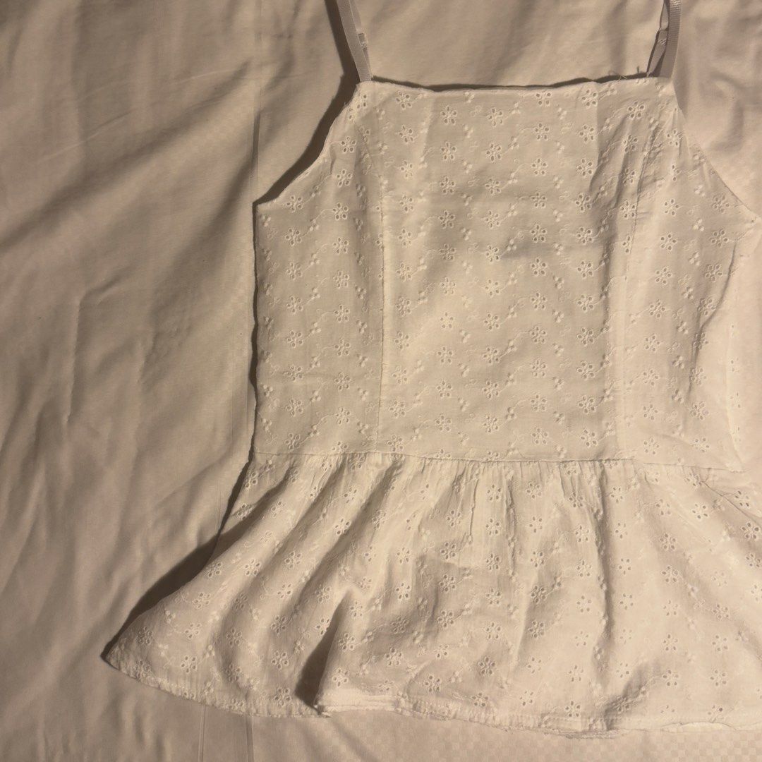 White Eyelet Peplum Camisole (Category: Sleeveless) located in Manila. Submitted by shopmakii (Listing ID 1470892496, Image 1). Description: - Brand: Lovito - Size: S (EU 34, US 4) - Color: White - Material: 65% Cotton, 35% Polyester - Condition: Worn a few times, solid condition - Perfect for warm weather and casual days out.