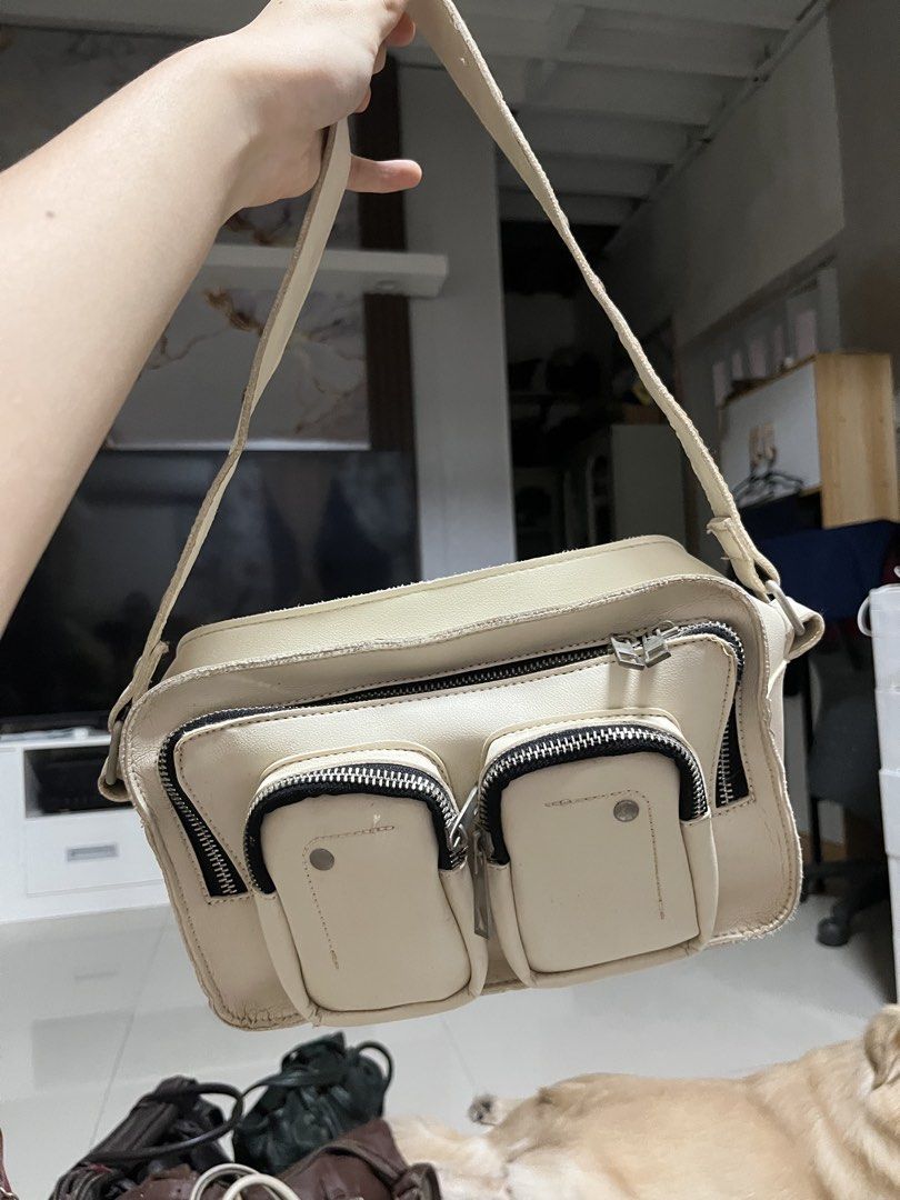 White Multi-Pocket Shoulder Bag with Studded Strap (Category: Shoulder Bags) located in General Trias. Submitted by walterwhiteyo (Listing ID 1470764084, Image 1). Description: see photos for the condition pls!.