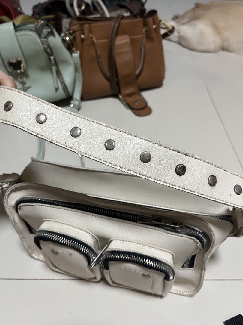 White Multi-Pocket Shoulder Bag with Studded Strap (Category: Shoulder Bags) located in General Trias. Submitted by walterwhiteyo (Listing ID 1470764084, Image 3). Description: see photos for the condition pls!.