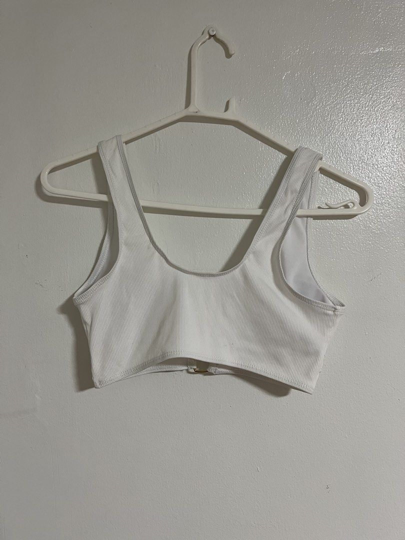 White Ribbed Crop Top with Heart Rings (Category: Shirts) located in Cabuyao City. Submitted by rdtrmt (Listing ID 1470773905, Image 3). Description: - Size: XS - Color: Clean white - Style: Sleeveless crop top with scoop neckline - Unique Detail: Front cut-out held by two small gold heart rings - Material: 90% polyester, 10% elastane (stretchy and comfortable) - Condition: still in good condition.
