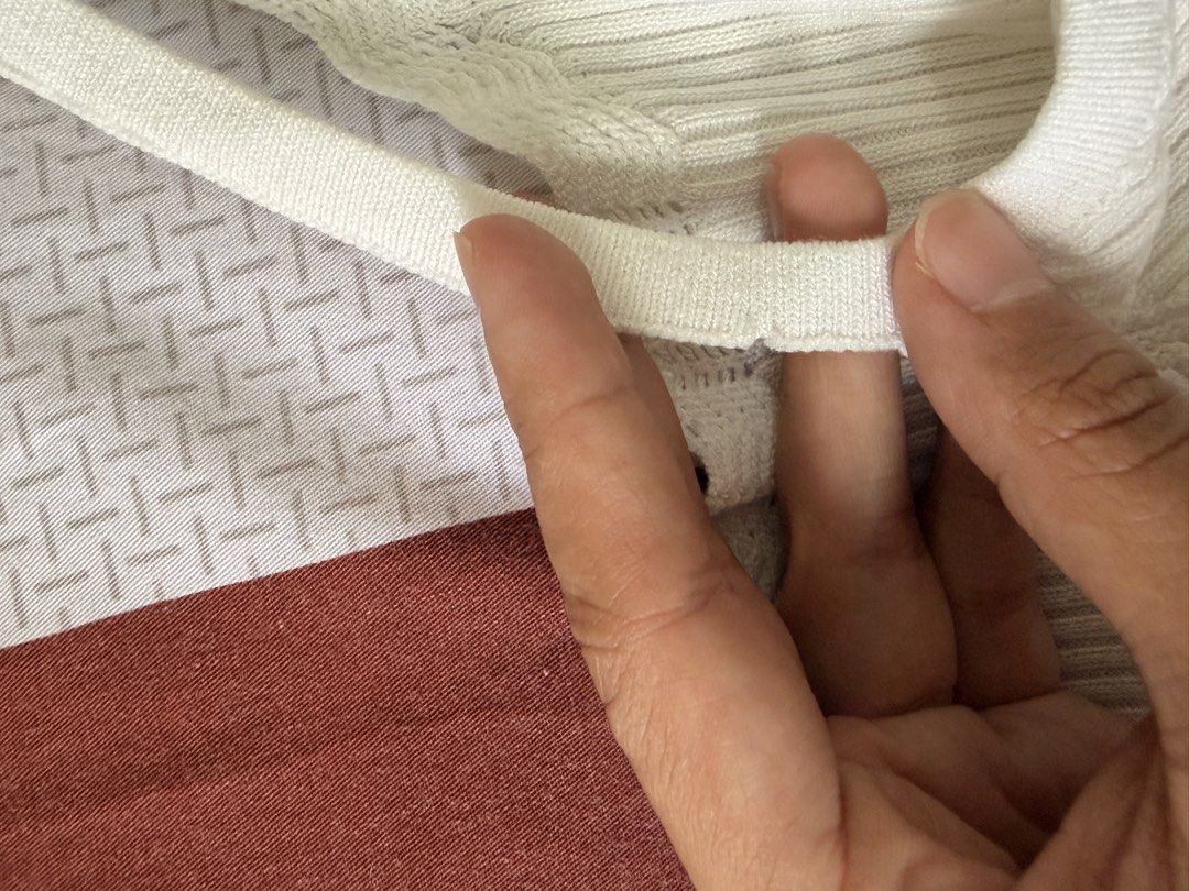 White ribbed tank top with scalloped hem (Category: Sleeveless) located in Marikina City. Submitted by _bananahanaa (Listing ID 1470801957, Image 3). Description: - Color: White - Material: Stretchy ribbed knit - Design: Square neckline with thin straps - Details: Scalloped lace trimming on neckline and bottom hem - Fit: True to size, super comfortable for daily wear - Styling: Great basic piece to match with jeans or skirts stretchy, can fit sma