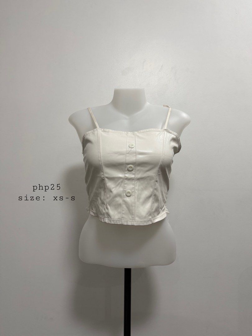 White Sleeveless Top (Category: Sleeveless) located in Antipolo. Submitted by nlknn_ (Listing ID 1470844899, Image 1). Description: .