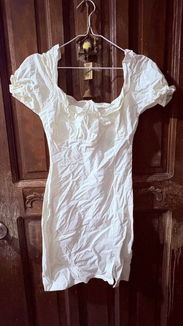 White square neck mini dress puff sleeves (Category: Dresses) located in Manila. Submitted by jaysieseva620 (Listing ID 1470827999, Image 1). Description: - Color: White - Style: Mini dress with fitted silhouette and short length - Details: Square neckline, cute puff sleeves, and textured fabric - Fit: Pullover style, easy to wear - Condition: Brand new/preloved, currently wrinkled from storage - Perfect for: Casual outings, dates, and weekend la