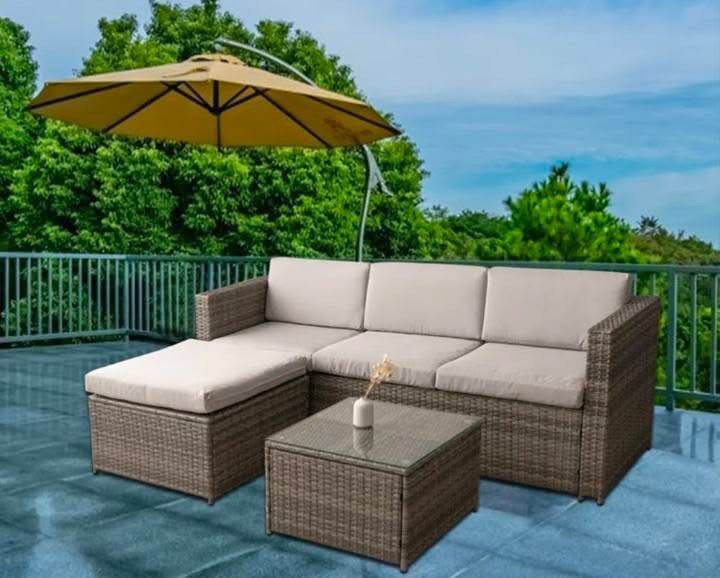 Wicker Patio Conversation Sofa Set with Table and Ottoman (Category: Sofas) located in Manila. Submitted by krissy_mercado (Listing ID 1470827063, Image 2). Description: - Complete set: Brown poly rattan sectional sofa, matching glass-top coffee table, and ottoman footrest - Comfort: Thick beige padded cushions for ultimate outdoor relaxation - Durability: Weather-resistant materials built for gardens, balconies, and poolside setups - Size: Total