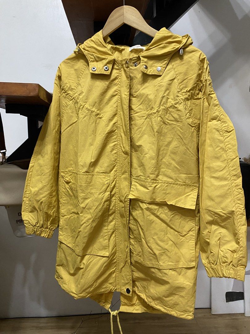 Wind breaker (Category: Coats, Jackets and Outerwear) located in Trece Martires City. Submitted by reloveandrestyle (Listing ID 1470839556, Image 3). Description: -Size S-Semi L -Mustard color -Buttons are all working/zipper -with draw string -Perfect for M -Can be autumn jacket (with some layers).