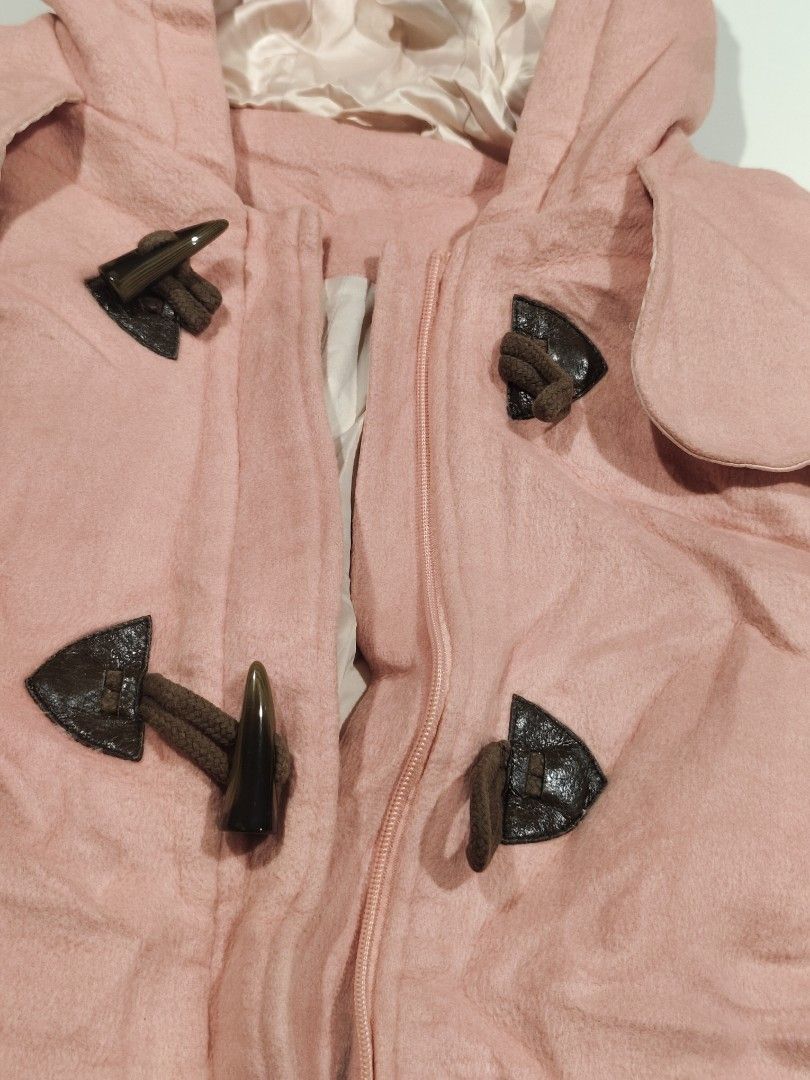 Winter Pink Hooded Cape Coat Size L (Category: Coats, Jackets and Outerwear) located in Makati City. Submitted by rrraiii (Listing ID 1470886307, Image 3). Description: selling my extra winter / autumn fits ❄️ - Brand: Chickeeduick - Color: Pink with pale pink satin lining - Size: L but best fit to S-M - Material: Warm wool-blend - Closure: Front zipper with toggle horn buttons - Pockets: Two front patch pockets - Style: Hooded cape coat, great f