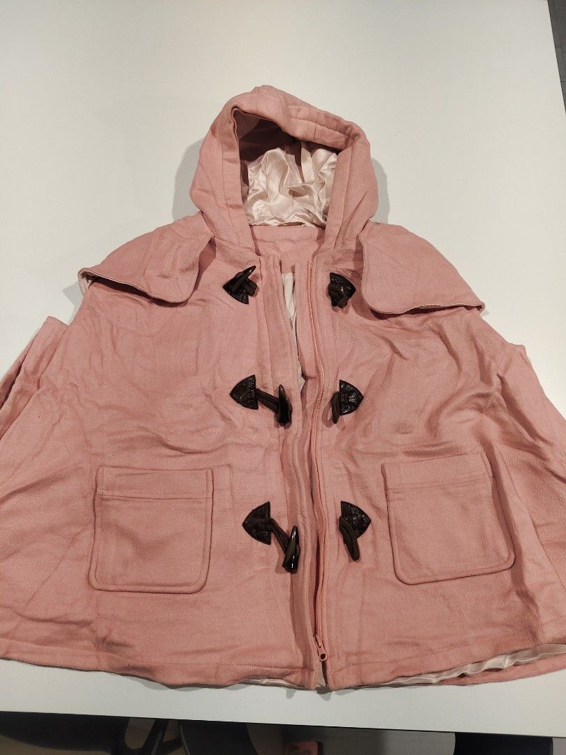 Winter Pink Hooded Cape Coat Size L (Category: Coats, Jackets and Outerwear) located in Makati City. Submitted by rrraiii (Listing ID 1470886307, Image 1). Description: selling my extra winter / autumn fits ❄️ - Brand: Chickeeduick - Color: Pink with pale pink satin lining - Size: L but best fit to S-M - Material: Warm wool-blend - Closure: Front zipper with toggle horn buttons - Pockets: Two front patch pockets - Style: Hooded cape coat, great f
