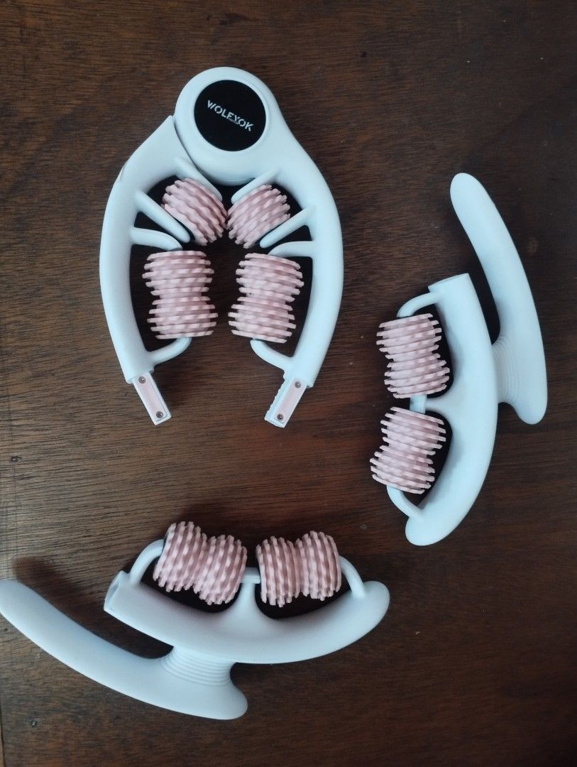 Wolfyok 360 Degree Muscle Roller Massager (Category: Massage Devices) located in Baguio. Submitted by katgon2016 (Listing ID 1470830715, Image 2). Description: - Brand: Wolfyok - Color: White frame with pink spiky rollers - Versatile use: Ideal for legs, arms, and neck - Benefits: Great for post-workout recovery, deep tissue massage, and relieving tight knots - Flexible design: Easily wraps around calves and thighs - Travel-friendly: Detaches int