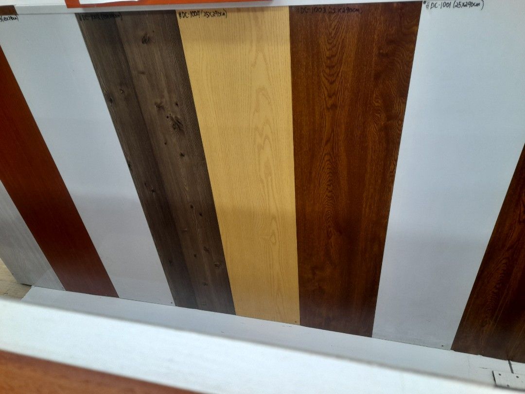 Wood Grain and Solid Color Wall Panels 25x290cm (Category: Wall Decor) located in Manila. Submitted by raquil24 (Listing ID 1470800793, Image 3). Description: - Product: Wall Panel Samples - Available Finishes: Wood grain, plain white, and modern grey - Standard Size: 25x290cm per panel - Best For: Interior accent walls, home renovations, and room updates - Model Numbers: DC-2001, DC-1008, #006, #001 - Condition: Brand new - Shipping/Meet-up: Sen