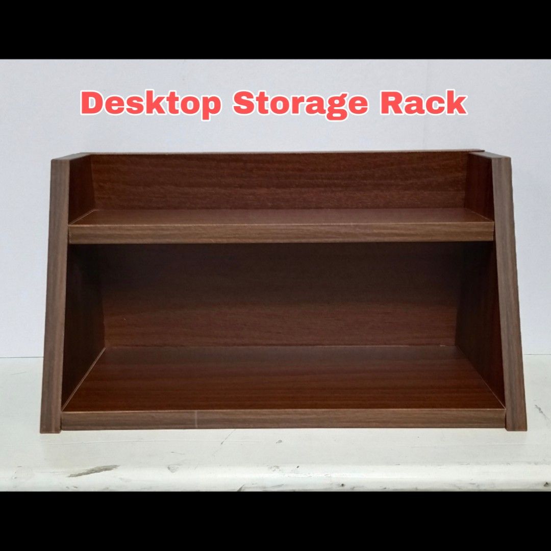 Wooden Desktop Storage Rack 2-Tier Shelf Organizer (Category: Shelves, Cabinets & Racks) located in Caloocan City. Submitted by dr3ideguzman (Listing ID 1470799570, Image 1). Description: - Brand New - Made of wood - Dimensions: 30cm(L) x 16cm(H) x 14cm(W) Loc: South Caloocan City Mod: Lalamove (Buyer will shoulder the shipping fee) Mop: GCash.