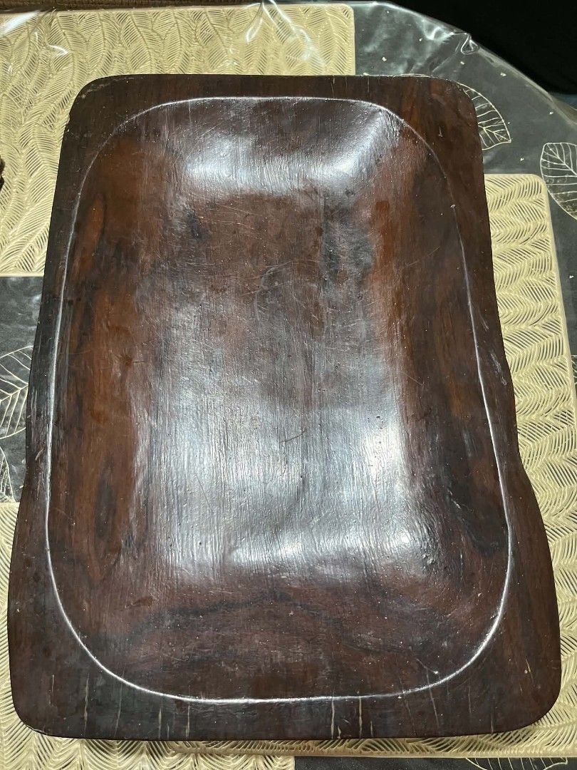 Wooden Wine Rack And Serving Trays Bundle Take All (Category: Shelves, Cabinets & Racks) located in Cagayan de Oro. Submitted by che21822 (Listing ID 1470781314, Image 3). Description: - Solid dark wood wine rack with a deep rich grain finish - Securely holds multiple wine bottles - Includes a unique two-tiered floral-shaped stand - Comes with two rectangular serving trays featuring recessed centers - Magkuno Wood - Perfect setup for home dining,