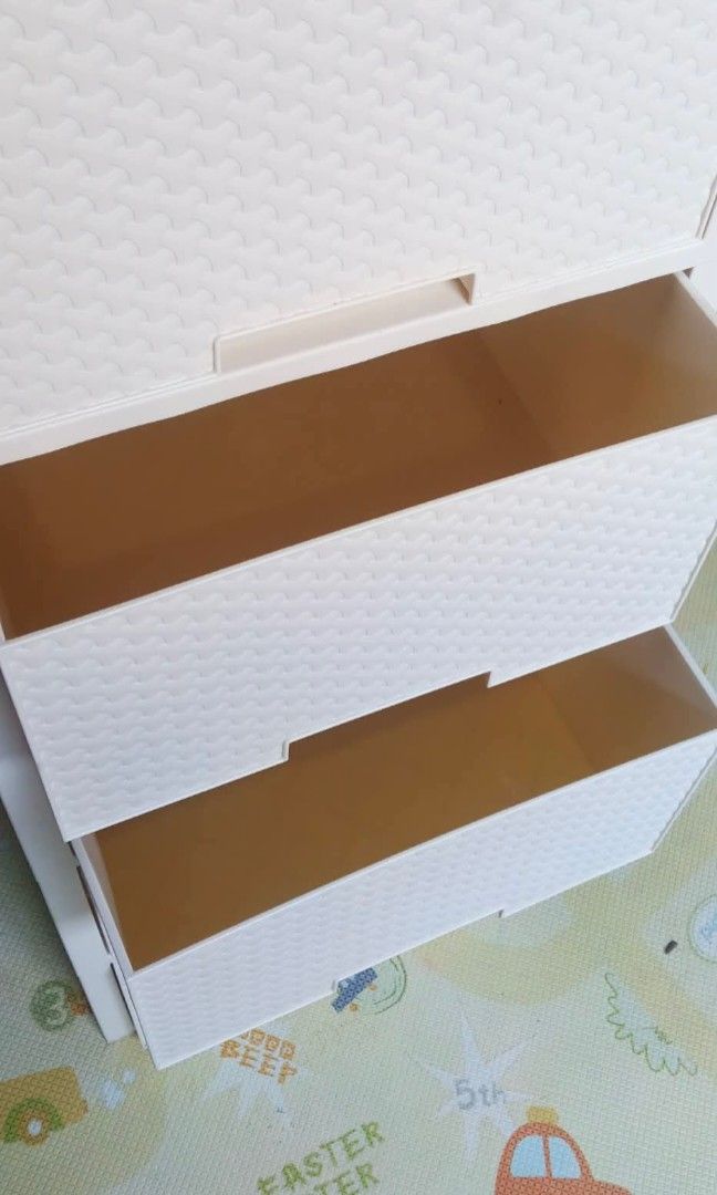 Woven Rattan Drawer (Category: Other Home Furniture) located in Manila. Submitted by jzjapansurplus (Listing ID 1470837767, Image 2). Description: IMPORTED FROM JAPAN WOVEN RATTAN STYLE TEXTURE ON FRONT CHEST DRAWER WITH 5PULL-OUTS 🔰DURABLE POLYPROPYLENE PLASTIC 🔰LIGHTWEIGHT 🔰MODERN LOOK 🔰NO ISSUE‼️ 🔰GOOD CONDITION.