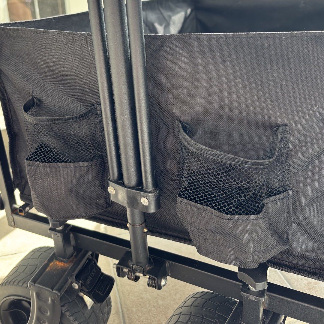 Wtab Outdoor Folding Utility Wagon Black (Category: Hiking & Camping) located in Pasig City. Submitted by zemira.elaine (Listing ID 1470793948, Image 3). Description: Issues: a little rusting on the metal near the front wheels Rfs: need a bigger wagon for my toddler/groceries, etc..