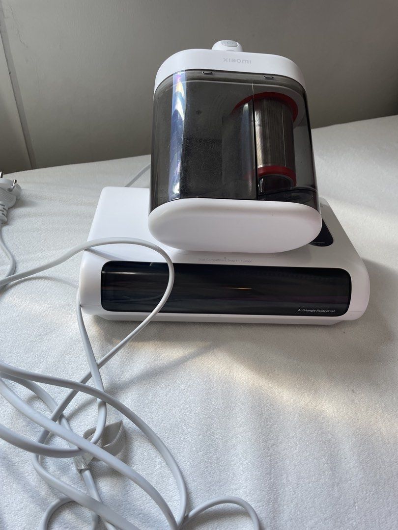 Xiaomi Dust Mite Vacuum Cleaner 2 Pro (Category: Vacuum Cleaner & Housekeeping) located in Dasmarinas. Submitted by yurisee (Listing ID 1470752560, Image 1). Description: - Product: Xiaomi Dust Mite Vacuum Cleaner 2 Pro (White) - Condition: Fully functional and clean, with only minor dust inside the container from testing - Key Features: Anti-tangle roller brush, hot air drying, UV light sterilization, and multiple suction modes - Power: Corded e