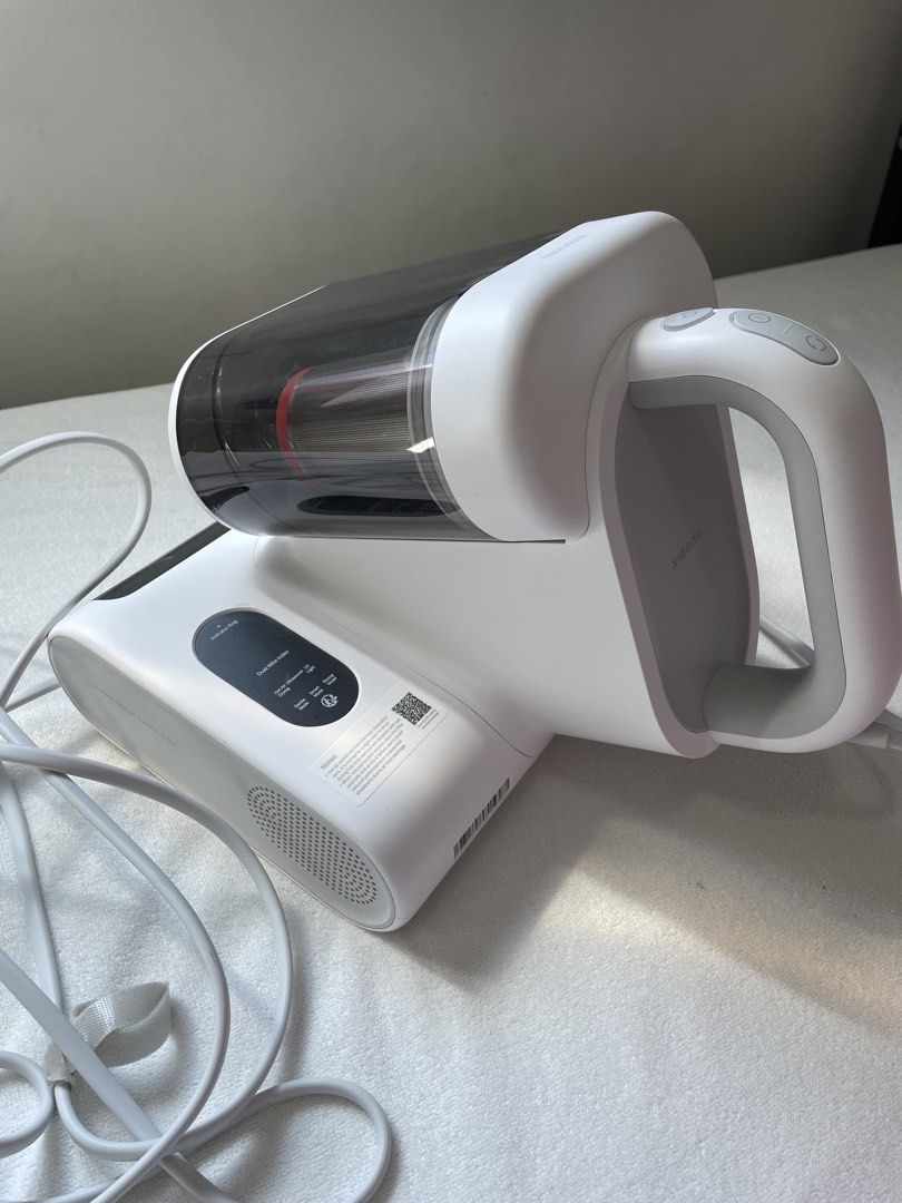 Xiaomi Dust Mite Vacuum Cleaner 2 Pro (Category: Vacuum Cleaner & Housekeeping) located in Dasmarinas. Submitted by yurisee (Listing ID 1470752560, Image 3). Description: - Product: Xiaomi Dust Mite Vacuum Cleaner 2 Pro (White) - Condition: Fully functional and clean, with only minor dust inside the container from testing - Key Features: Anti-tangle roller brush, hot air drying, UV light sterilization, and multiple suction modes - Power: Corded e