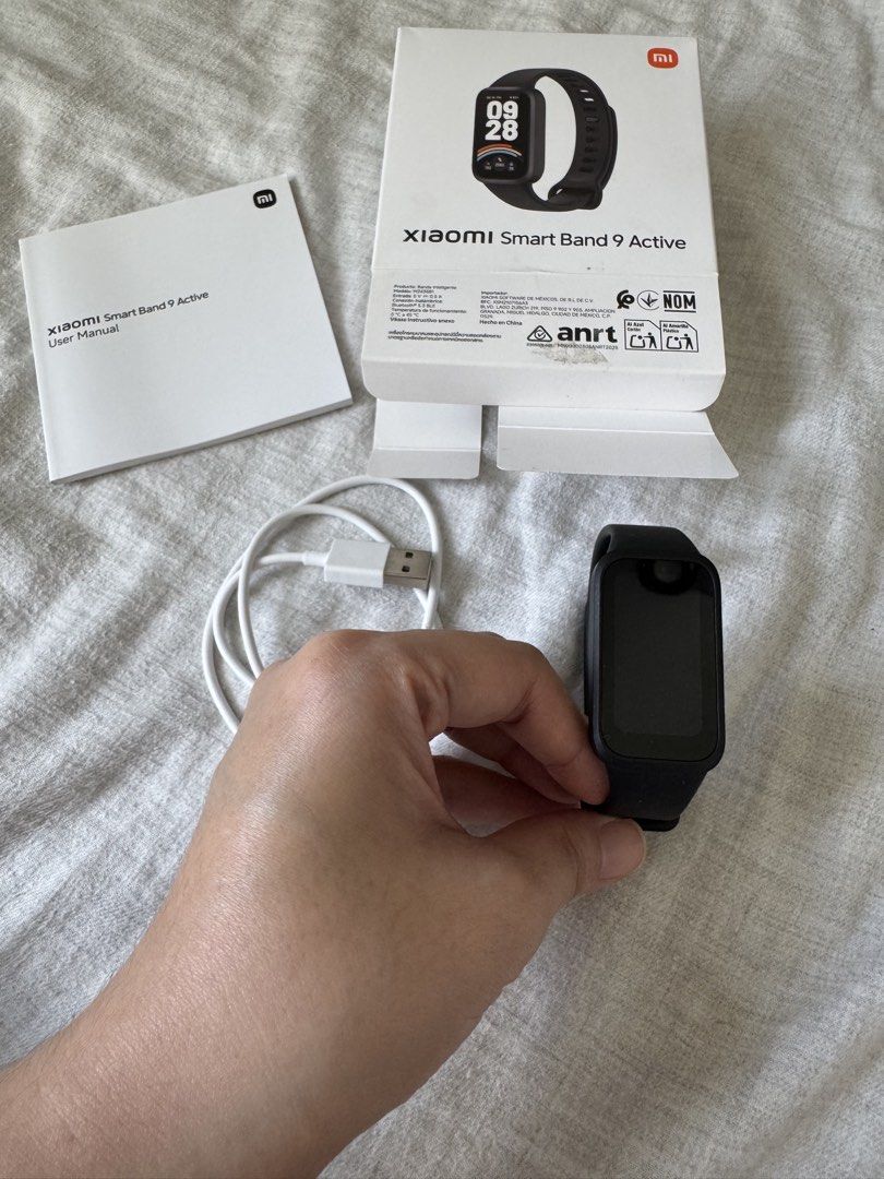 XIAOMI Smart Band 9 Active Watch (Category: Wearables & Smart Watches) located in Pasig City. Submitted by lurvethrift (Listing ID 1470775033, Image 3). Description: - Brand: Xiaomi - Model: Smart Band 9 Active - Color: Black - Condition: Brand new with original box, charging cable, and user manual - Key Features: 1.47" ultra-large display, up to 18-day battery life, all-day heart rate & SpO2 monitoring, scientific sleep monitoring, 50 sports mod