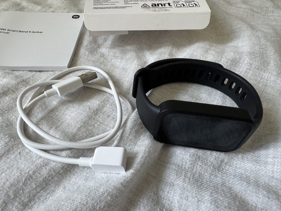 XIAOMI Smart Band 9 Active Watch (Category: Wearables & Smart Watches) located in Pasig City. Submitted by lurvethrift (Listing ID 1470775033, Image 2). Description: - Brand: Xiaomi - Model: Smart Band 9 Active - Color: Black - Condition: Brand new with original box, charging cable, and user manual - Key Features: 1.47" ultra-large display, up to 18-day battery life, all-day heart rate & SpO2 monitoring, scientific sleep monitoring, 50 sports mod