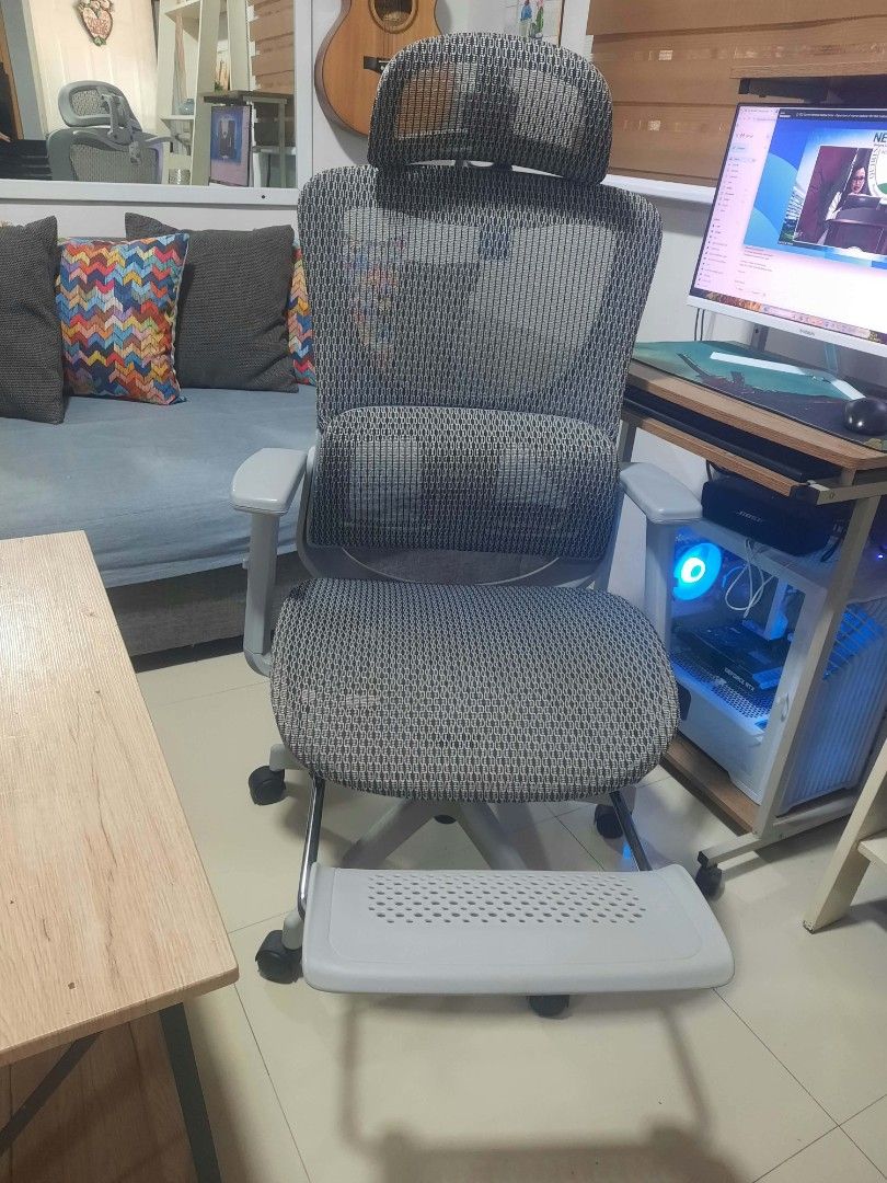 Xpanse LS918 Ergonomic Office Chair (Category: Office Furniture & Fixtures) located in Tanza. Submitted by puremoon.ef3667 (Listing ID 1470776451, Image 3). Description: - Model: Xpanse LS918 Ergonomic Office Chair - Color: Sleek Grey - Condition: Brand new with tag still attached to the back mesh - Material: Breathable full mesh - Comfort Features: 3D adjustable headrest and armrests, floating lumbar support - Extra: Convenient pull-out footrest