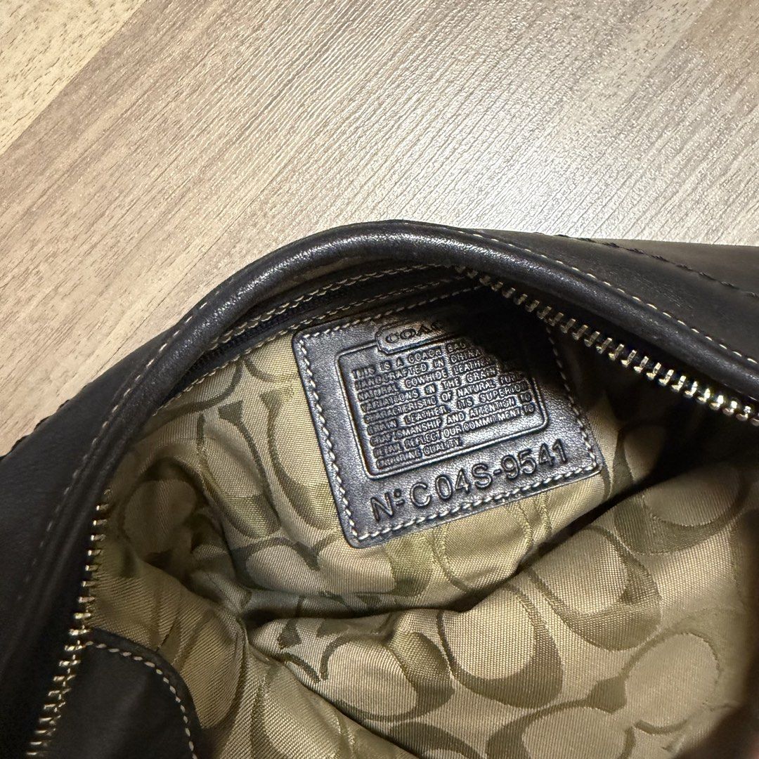 Y2K Coach Shoulder Bag Black Vintage Small (Category: Luxury Bags & Wallets) located in Quezon City. Submitted by bmason0408 (Listing ID 1470906796, Image 3). Description: - Brand: Coach - Style: Compact shoulder bag / daily grab-and-go - Material: Black leather with contrast white stitching - Hardware: Silver-tone - Closure: Zipper top closure - Interior: Signature C fabric lining with creed patch (Style Number: NºC 04S-9541) - Strap: Adjustable