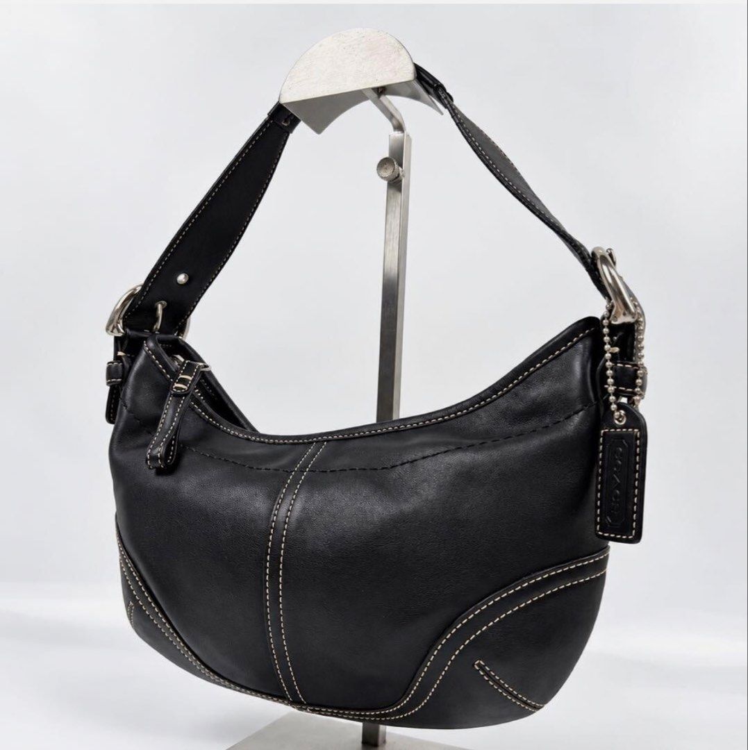 Y2K Coach Shoulder Bag Black Vintage Small (Category: Luxury Bags & Wallets) located in Quezon City. Submitted by bmason0408 (Listing ID 1470906796, Image 1). Description: - Brand: Coach - Style: Compact shoulder bag / daily grab-and-go - Material: Black leather with contrast white stitching - Hardware: Silver-tone - Closure: Zipper top closure - Interior: Signature C fabric lining with creed patch (Style Number: NºC 04S-9541) - Strap: Adjustable