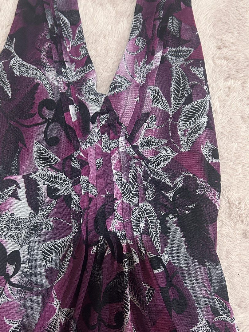 y2k floral halter top (Category: Sleeveless) located in Manila. Submitted by divalicious_ (Listing ID 1470810273, Image 2). Description: 💌 very hard to let go of, will keep if not sold ! 🥹 🧺 never used – just needs a bit of love (steaming) 🪡 no defects! 🧷 size: small to large (really stretchable) ✨ y2k dark purple and black floral halter top 📬 mop: gcash 📦 mod: lalamove (buyer shoulders shipping fee) seller will not liable for any shipping