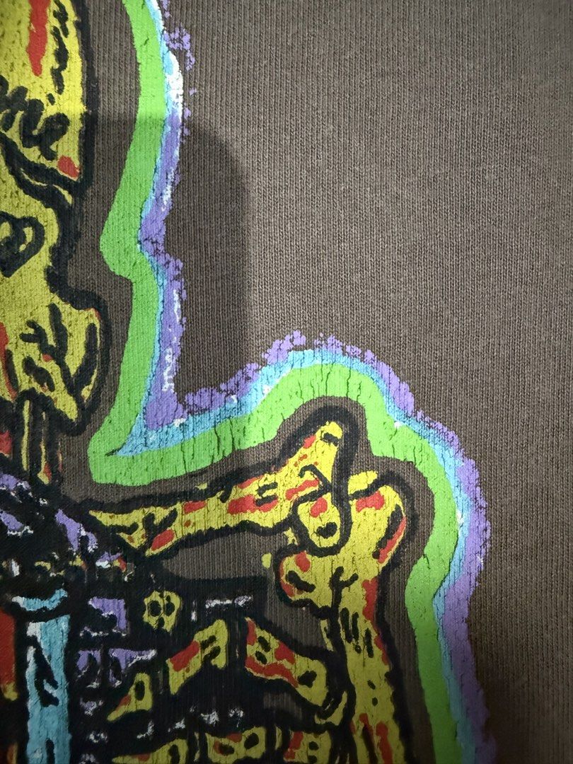 Yeezy x XXXTentacion Hold the Gate (Category: Tshirts & Polo Shirts ) located in Manila. Submitted by keepercollection (Listing ID 1470830713, Image 3). Description: - Brand: HLUT - Size: Medium - Color: Brown - Design: Bold skull, gateway, and reaper graphics with "WHEN I'M ON THE WAY HOLD THE GATE" and "SHE WANT TO GIVE YOU THE COOKIE" text - Fit: Short sleeves, standard crew neck - Condition: Minor cracking on screen print (refer to close-up p