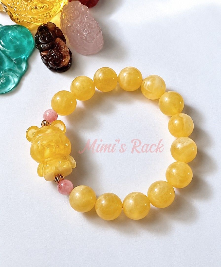 Yellow Beeswax Amber Bear Charm Bracelet (Category: Bracelets) located in Taguig. Submitted by mimisrack (Listing ID 1470897921, Image 3). Description: 💛🛡️ Protection & Security — amber is traditionally associated with protection, grounding, and a sense of safety. 🍀 Good Luck & Fortune — its warm golden-yellow color symbolizes blessings and favorable opportunities. 💰 Wealth & Abundance — golden hues represent prosperity, success, and financia