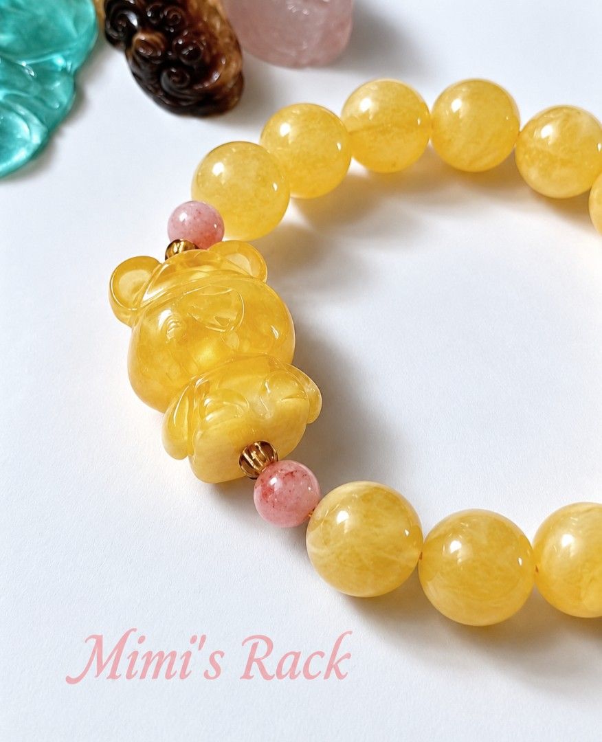 Yellow Beeswax Amber Bear Charm Bracelet (Category: Bracelets) located in Taguig. Submitted by mimisrack (Listing ID 1470897921, Image 2). Description: 💛🛡️ Protection & Security — amber is traditionally associated with protection, grounding, and a sense of safety. 🍀 Good Luck & Fortune — its warm golden-yellow color symbolizes blessings and favorable opportunities. 💰 Wealth & Abundance — golden hues represent prosperity, success, and financia