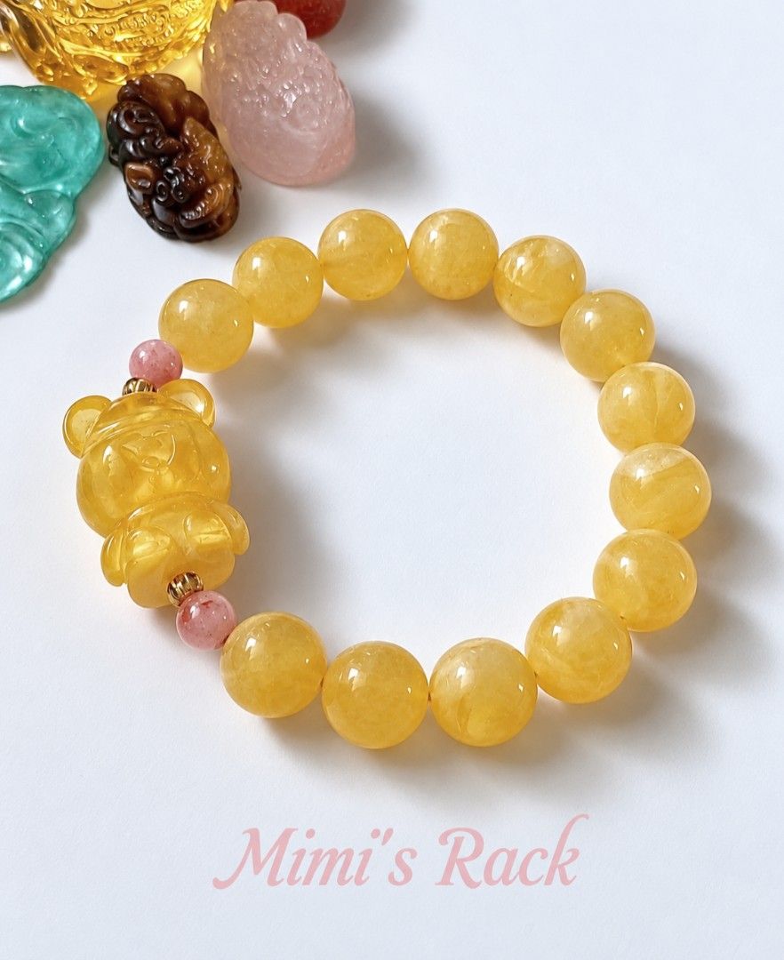 Yellow Beeswax Amber Bear Charm Bracelet (Category: Bracelets) located in Taguig. Submitted by mimisrack (Listing ID 1470897921, Image 1). Description: 💛🛡️ Protection & Security — amber is traditionally associated with protection, grounding, and a sense of safety. 🍀 Good Luck & Fortune — its warm golden-yellow color symbolizes blessings and favorable opportunities. 💰 Wealth & Abundance — golden hues represent prosperity, success, and financia