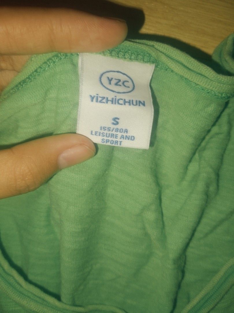 Green Butterfly Sequins T-shirt Size S (Category: Shirts) located in Naga. Submitted by francethriftee3 (Listing ID 1470803931, Image 3). Description: Location: Camarines Sur, Bicol - Brand: Yizhichun - Size: Small (155/80A) - Color: Green - Design: Cute sequin butterfly graphic with floral fabric panels inside the wings - Material: Soft and comfortableric - Neckline: Classic round neck - Condition: Great for everyday casual outfits.