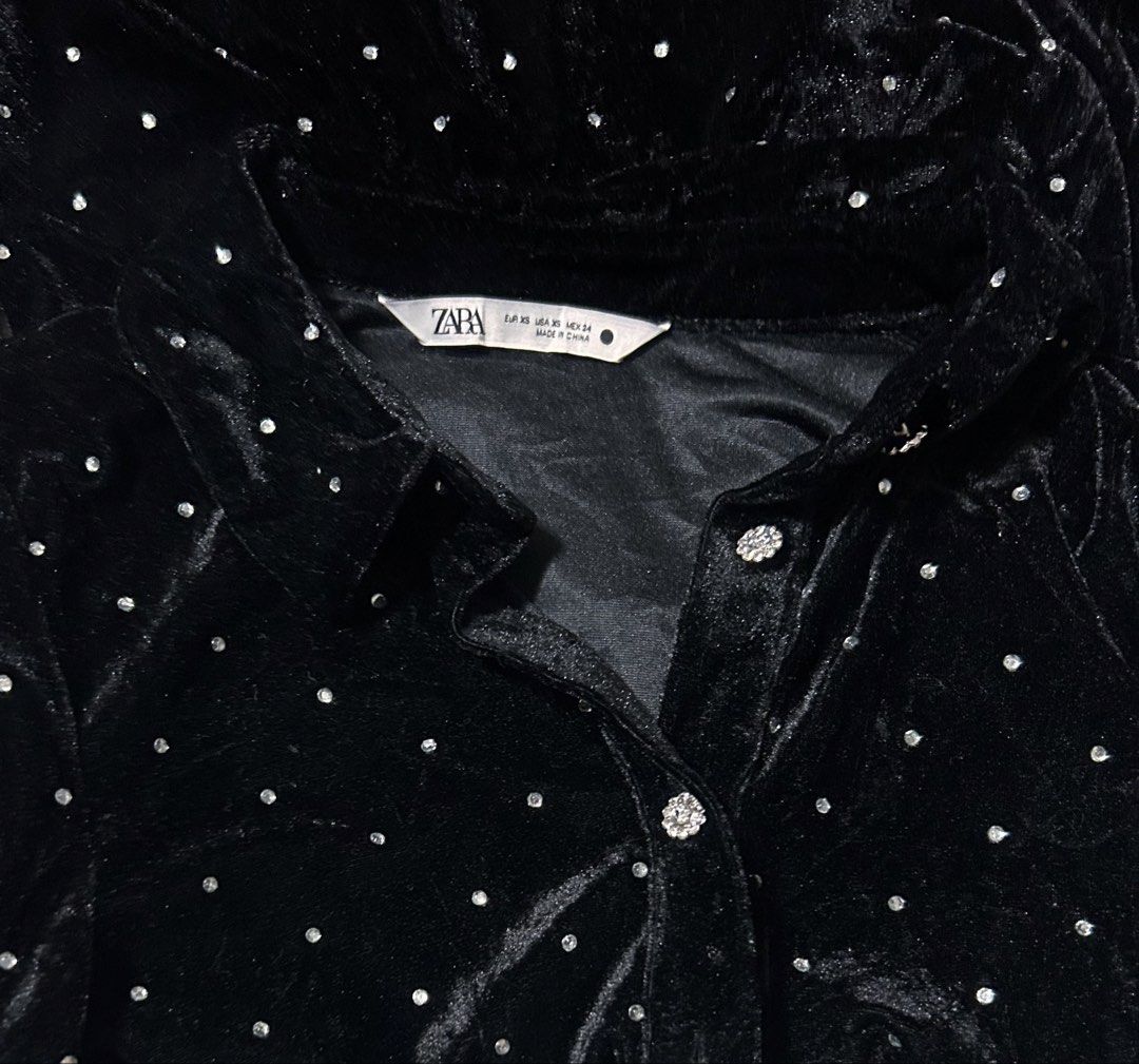 ZARA (Category: Dresses) located in Davao. Submitted by sart0ria85 (Listing ID 1470822112, Image 3). Description: A deep black velvet bodycon dress with silver crystal studs and a crystal embossed buttons. 100%POLYESTER MADE IN CHINA 🇨🇳 XSMALL. Size 2 Non-stretchable. EXCELLENT CONDITION (99/100).
