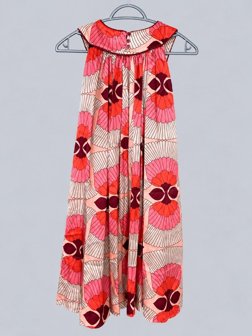 Zara Basic Floral Print Sleeveless Midi Dress (Category: Dresses) located in Bacoor. Submitted by goodfinds02 (Listing ID 1470844960, Image 2). Description: - Brand: Zara Basic - Style: Sleeveless midi dress with a flowy fit - Pattern: Vibrant pink and red floral print - Details: Button closure at the neckline, lightweight fabric - Condition: Brand new with clean tag attached - Perfect for: Casual outings and sunny days.