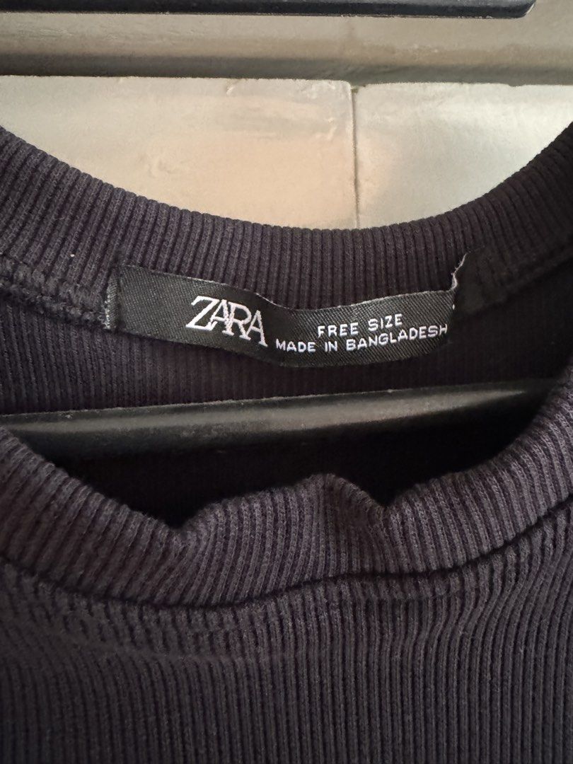 Zara Black Ribbed Tank Top Free Size (Category: Sleeveless) located in Taytay. Submitted by darkswan016 (Listing ID 1470830581, Image 2). Description: - Brand: Zara - Color: Classic Black - Style: Ribbed tank top with crew neckline and sleeveless cut - Material: Soft textured knit, very stretchy - Size: Free size (Made in Bangladesh) - Condition: Excellent, clean fabric with no flaws.