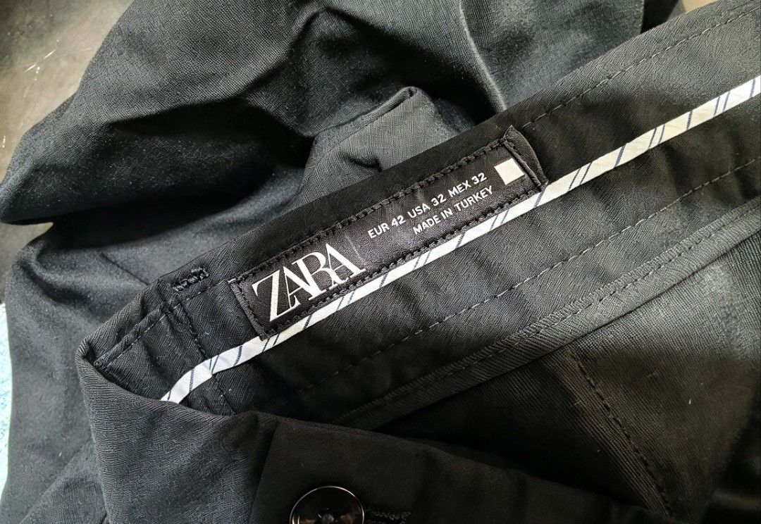 Zara Black Trousers Pants Size 32 (Category: Other Bottoms) located in Manila. Submitted by charlottej01596 (Listing ID 1470744140, Image 1). Description: - Brand: Zara - Size: EUR 42 / USA 32 / MEX 32 - Color: Classic Black - Origin: Made in Turkey - Features: Button and zip closure, belt loops - Condition: Very good (worn only a couple of times) - Style: Versatile for casual or smart outfits.