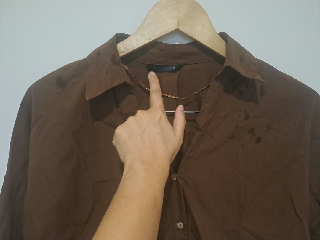 ZARA BROWN TOPS (Category: Blouses) located in Mandaluyong City. Submitted by epicowl-c93c (Listing ID 1470787249, Image 2). Description: The image shows a Zara brown, loose-fit button-down shirt with a classic collar and 3/4-length drop-shoulder sleeves..