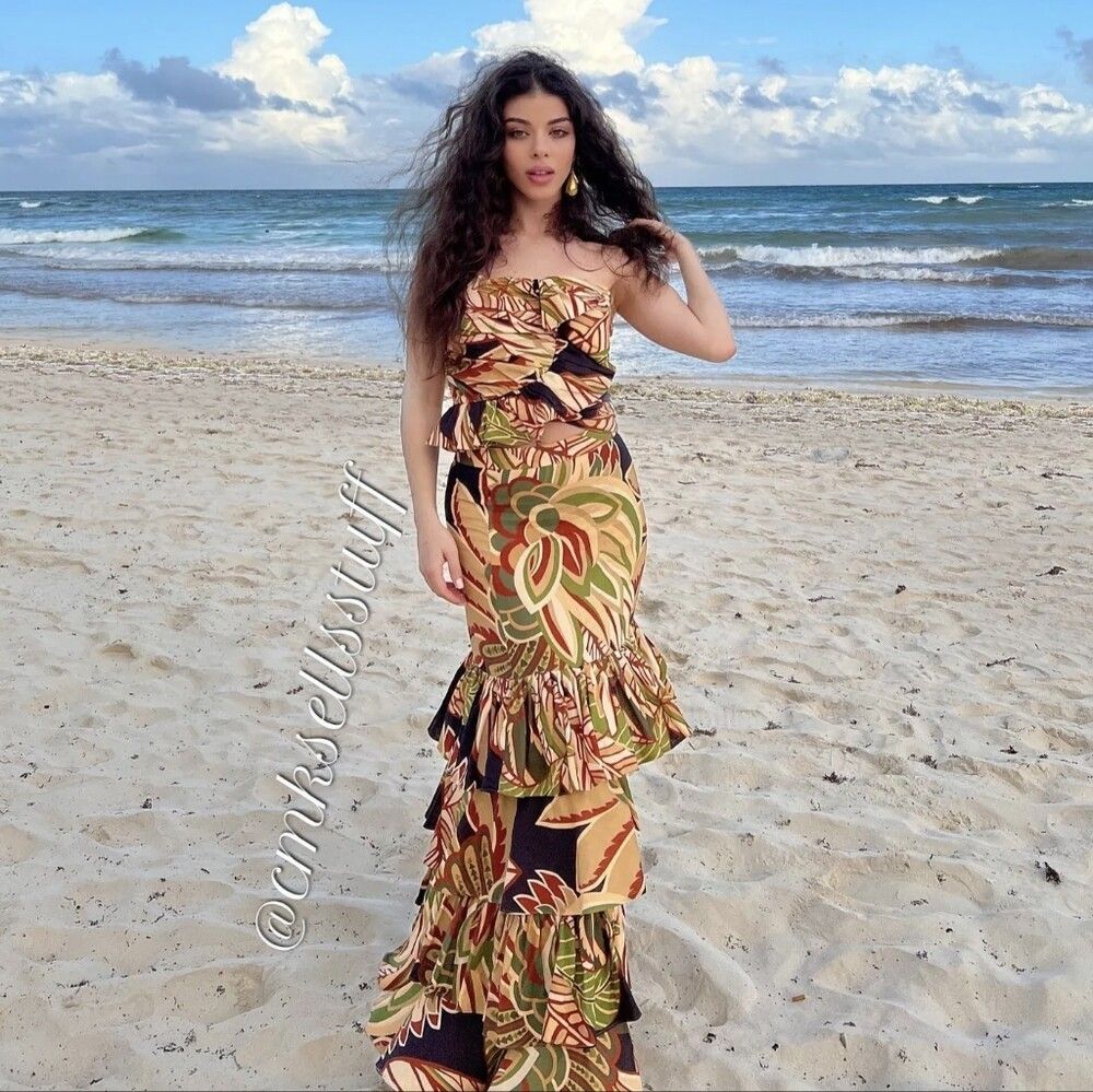 Zara Tropical Leaf Print Ruffle Two-Piece Set (Category: Sets or Coordinates) located in Taguig. Submitted by ashie_clothing (Listing ID 1470844591, Image 2). Description: - Brand: Zara - Style: Matching strapless bandeau top and long layered tiered maxi skirt set - Print/Color: Bold tropical leaf print in olive green, tan, brown, and black - Details: Ruffle accents on the top and bottom tiers - Size: XL (applies to both top and bottom) - Origin: