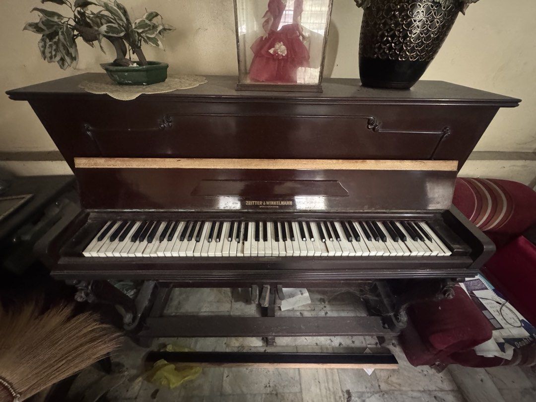 Zeitter & Winkelmann Braunschweig Upright Piano (Category: Musical Instruments) located in Manila. Submitted by jvsou31 (Listing ID 1470886322, Image 3). Description: - Brand/Origin: Zeitter & Winkelmann - Logistics: Heavy piece, buyer must arrange own transport and movers Honestly willing to take any serious offers, just take it out of my hands🙂.