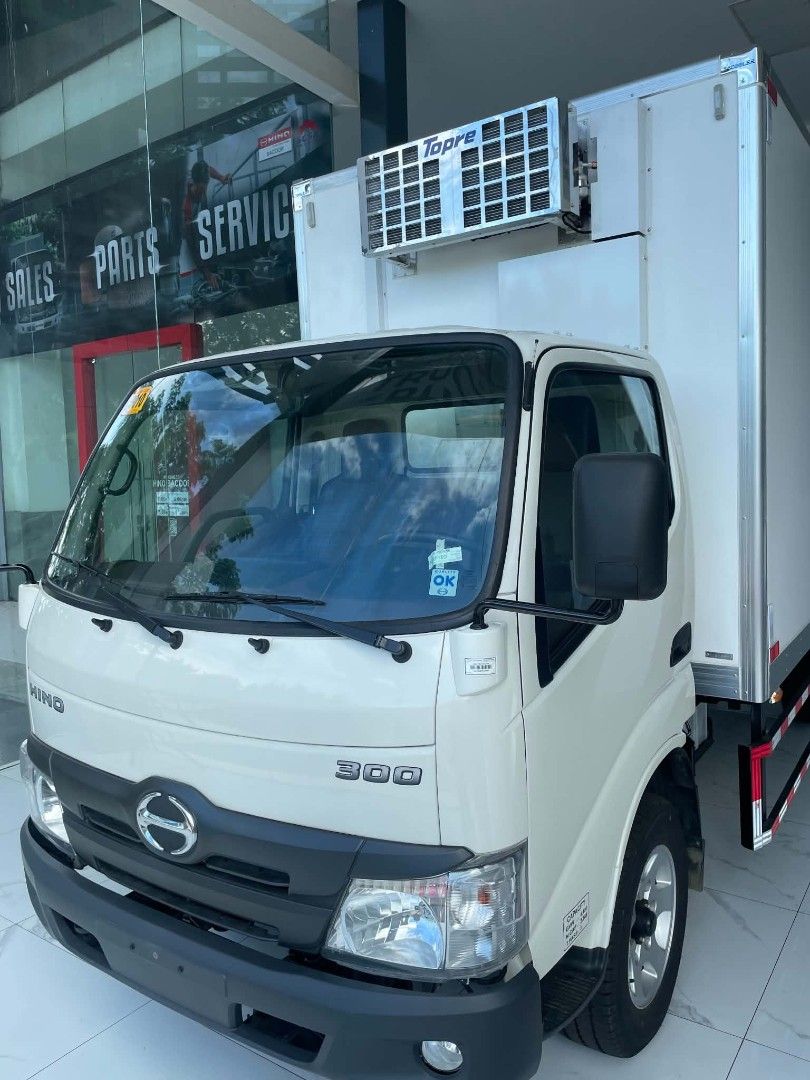 ZERO DOWNPAYMENT BRAND NEW 14FT REF VAN HINO 300 SERIES (Category: Heavy Vehicles) located in Bacoor. Submitted by eadricellie (Listing ID 1470752996, Image 1). Description: ‼️AVAILABLE ON HAND STOCKS REF VAN‼️ HINO 300 SERIES 14FT REF VAN SASAPIT NA ANG HOLIDAY SEASON BAKA PARA SAYO NA TO!🫡 SALUBONGIN ANG BAGONG TAON NA POSITIBO✨️✨️🙏 BAKA ISA KA SA HINO! esti DITO! ✅️FROZEN MEAT ✅️FROZEN FOODS & PRODUCTS ✅️FRUITS AND VEGETABLES ✅️CUBE ICE 📢PW