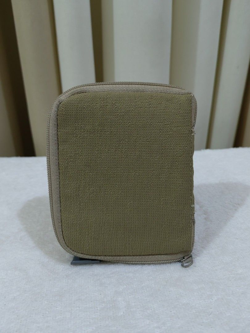 Zip Around Wallet with Card Inserts (Category: Wallets & Card holders) located in Makati City. Submitted by prelovedtreatedwithlove (Listing ID 1470898449, Image 2). Description: Brand: Flying-Fin - Closure: Secure zip-around design with sturdy YKK zippers - Material: Durable fabric - Interior Features: - Zippered coin very unique - Removable plastic card sleeves for extra storage - Condition: Excellent, well-maintained - Perfect, compact size fo
