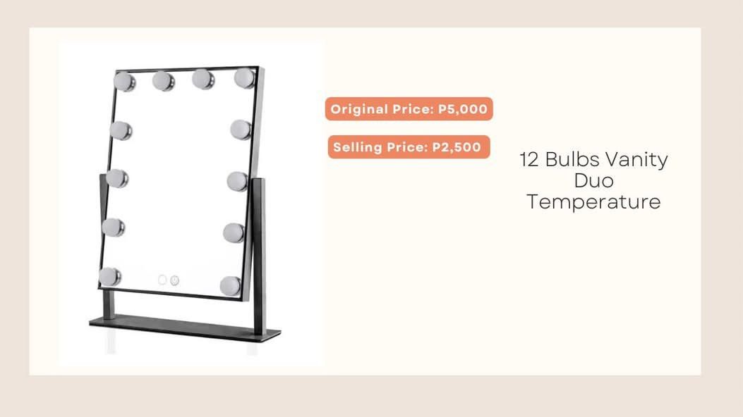 12 Bulbs Vanity Mirror Duo Temperature (Category: Mirrors) located in Manila. Submitted by nallajean (Listing ID 1470959006, Image 1). Description: - 12 bright bulbs with dual temperature lighting settings - Stylish black frame and stand design - Ideal for flawless makeup application and daily prep - Original Price: ₱5,000 - Selling Price: ₱2,500 (50% off!) No box .