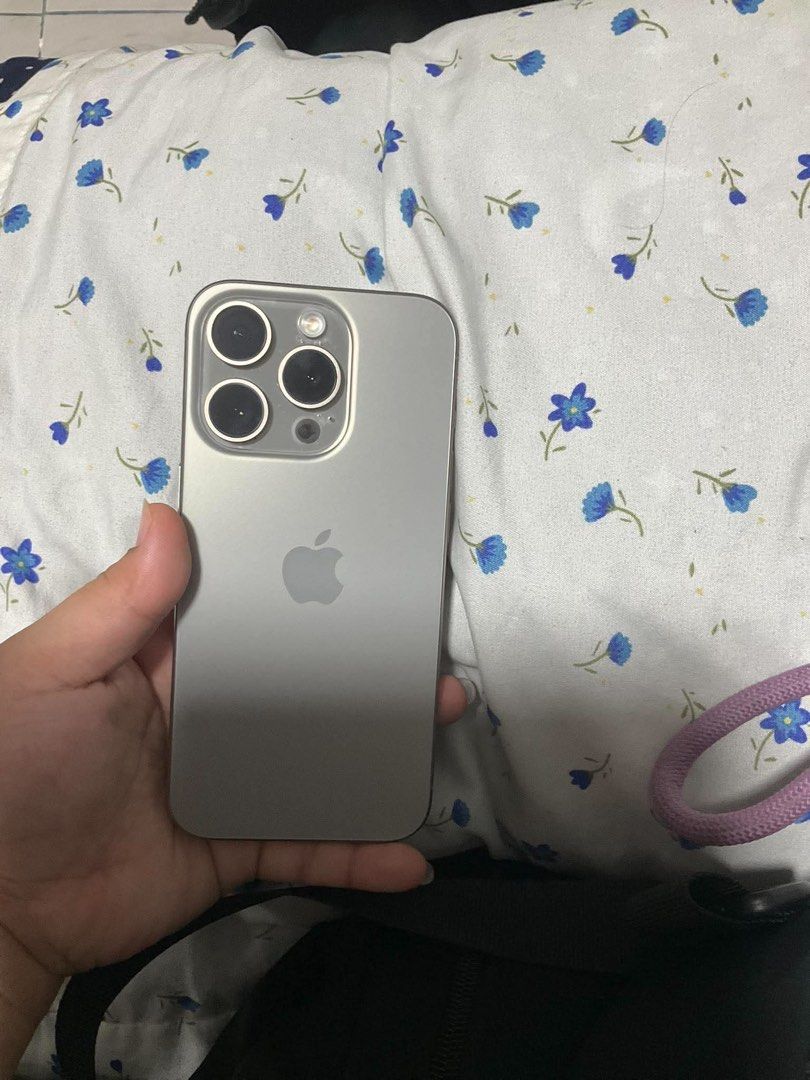 15 Pro 128 GB (Category: iPhone 15 Series) located in Quezon City. Submitted by ejulianne (Listing ID 1470948572, Image 2). Description: 15 pro Natural titanium 128 GB 80% BH No issue and never repaired Any sim With Box With Free Phone cases.