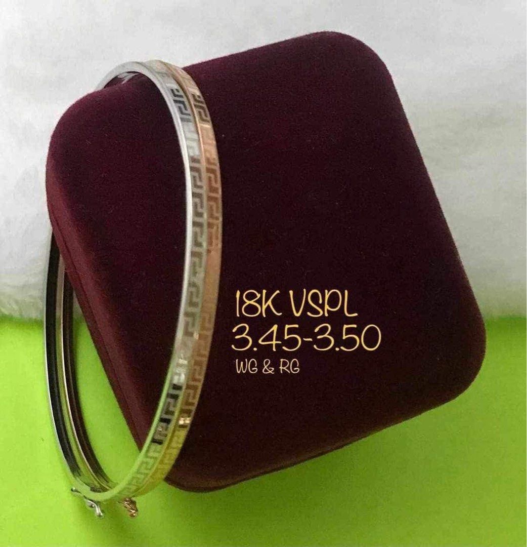 18K VSPL Bangle White Gold Rose Gold (Category: Bracelets) located in Bacolod City. Submitted by chuchaystuffs (Listing ID 1470955835, Image 1). Description: - Material: Genuine 18K white gold and rose gold two-tone - Weight: 3.45 to 3.50 grams - Design: Elegant engraved Greek key pattern - Closure: Secure hinge clasp with safety mechanism - Inclusion: Free velvet jewelry box - Condition: Brand new and high quality.